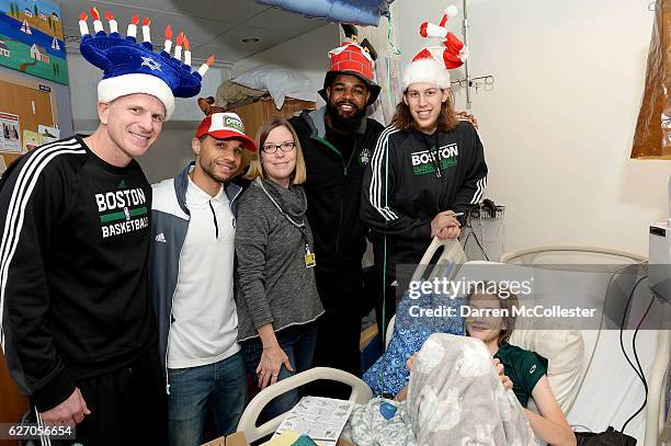 Boston Celtics Jay Larranaga, Kenny Graves, Amir Johnson, and Kelly Olynyk visit with Sam and Mom at Boston Children's Hospital on December 1, 2016...