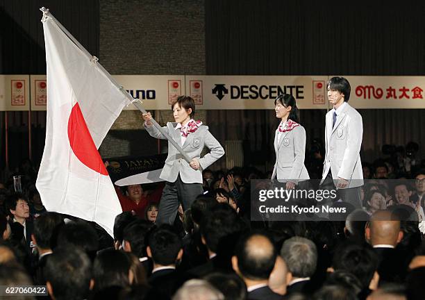 Japan - Japanfs Sochi Winter Olympics team captain Noriaki Kasai and other leaders enter the teamfs send-off party at a Tokyo hotel Jan. 20, 2014....