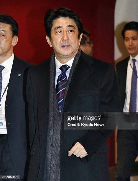 Switzerland - Japanese Prime Minister Shinzo Abe arrives at a hotel in Zurich on Jan. 21, 2014. Abe was visiting Switzerland to attend the World...