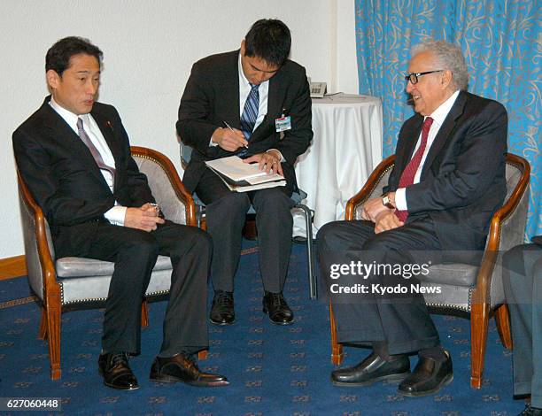 Switzerland - Japanese Foreign Minister Fumio Kishida holds talks with Lakhdar Brahimi, the United Nations and League of Arab States joint special...