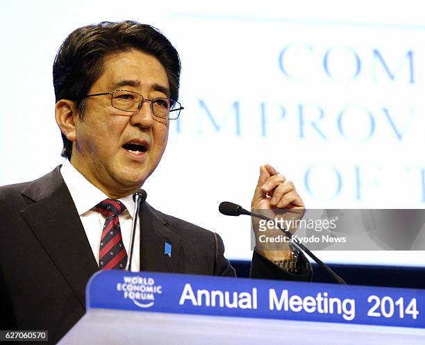 Switzerland - Japanese Prime Minister Shinzo Abe delivers a speech at the opening session of the World Economic Forum in the Swiss resort of Davos on...