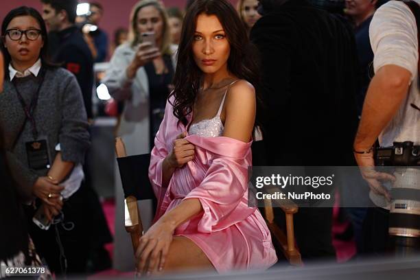 Bella Hadid prepare the backstage prior to the Victoria's Secret Fashion Show on November 30, 2016 in Paris, France.