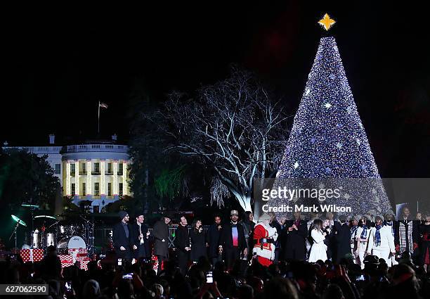President Barack Obama and his family sing Jingle Bells with Eva Longoria, Marc Anthony, James Taylor, Trisha Yearwood, Garth Brooks, Chance the...