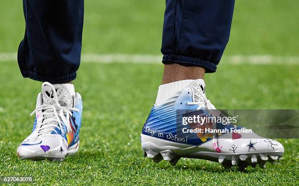 Brice Butler of the Dallas Cowboys wears personalized cleats during pregame warmups before facing the Minnesota Vikings on December 1, 2016 at US...