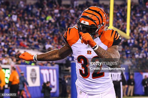 Cincinnati Bengals running back Jeremy Hill celebrates after scoring a touchdown during the second half of the National Football League game between...