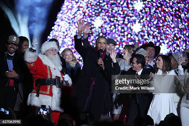President Barack Obama sings Jingle Bells with Eva Longoria, Marc Anthony, James Taylor, Trisha Yearwood, Garth Brooks, Kelly Clarkson, Kim Taylor,...