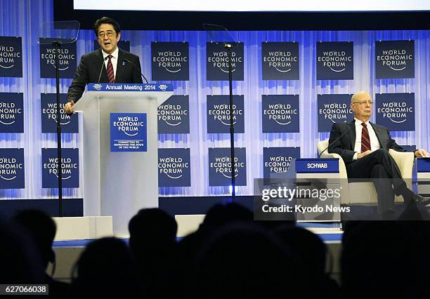 Switzerland - Japanese Prime Minister Shinzo Abe delivers a speech at the opening session of the World Economic Forum in the Swiss resort of Davos on...