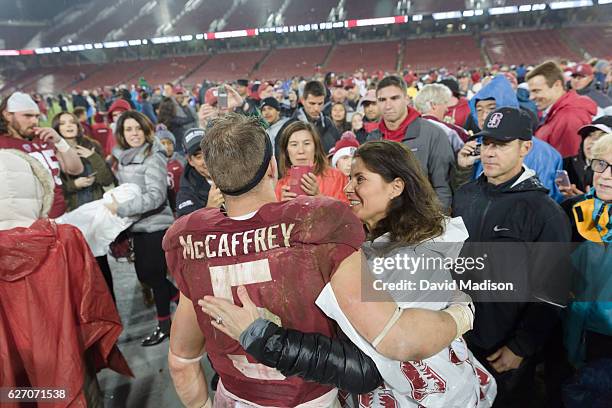 Christian McCaffrey of the Stanford Cardinal is greeted by his mother Lisa McCaffrey following an NCAA football game against the Rice Owls played on...