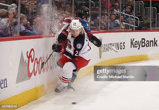 William Karlsson of the Columbus Blue Jackets skates against John Mitchell the Colorado Avalanche at the Pepsi Center on December 01, 2016 in Denver,...