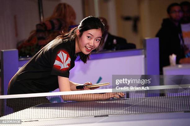 Shirley Fu plays table tennis at the 8th Annual TopSpin New York Charity Event at Metropolitan Pavilion on December 1, 2016 in New York City.