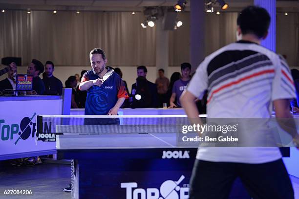Tahl Leibovitz and Adam Hugh play table tennis at the 8th Annual TopSpin New York Charity Event at Metropolitan Pavilion on December 1, 2016 in New...