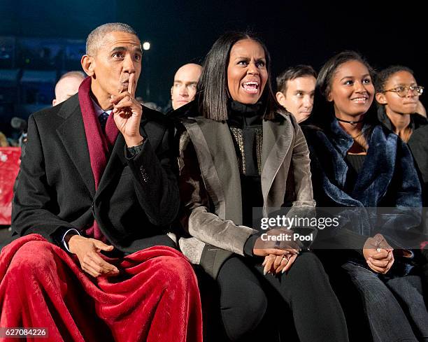 President Barack Obama, first lady Michelle Obama and daughter Sasha Obama attend the National Christmas Tree Lighting on the Ellipse December 1,...