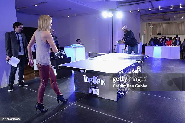 Former New York Knick, Larry Johnson and Rebecca Haarlow participate in tournament at the 8th Annual TopSpin New York Charity Event at Metropolitan...