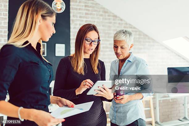 youth and experience in business. - cheftrainer stockfoto's en -beelden