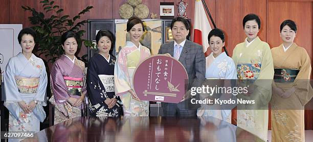 Japan - Yoshino Kimura and other kimono-clad actresses pay a courtesy visit to agriculture minister Yoshimasa Hayashi on Jan. 27 as part of a...