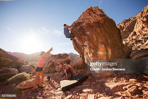 friends climbing on a sunny day. - nevada hiking stock pictures, royalty-free photos & images