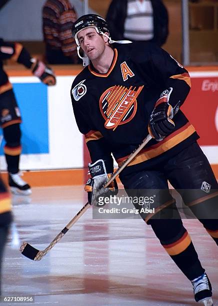 Doug Lidster of the Vancouver Canucks skates in warmup prior to a game against the Toronto Maple Leafs on December 7, 1991 at Maple Leaf Gardens in...