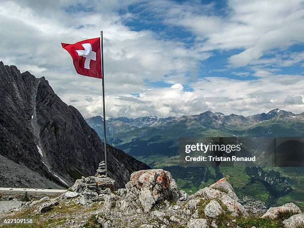 like a swiss flag in the wind - swiss flag stockfoto's en -beelden