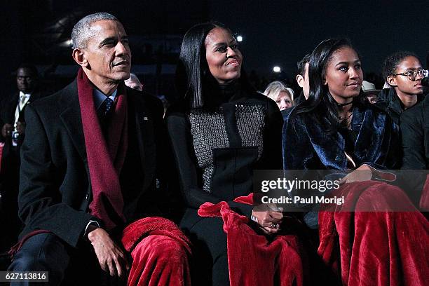 President Barack Obama sits with first lady Michelle Obama and their daughter Sasha to watch musical perfomances during the 94th Annual National...