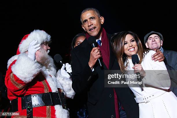 President Barack Obama sings "Jingle Bells" with Santa Claus, Eva Longoria and James Taylor during the 94th Annual National Christmas Tree Lighting...