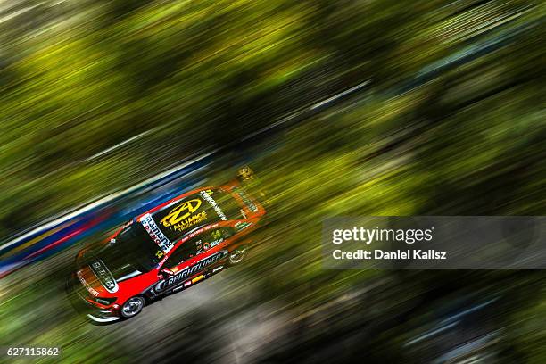 Tim Slade drives the Freightliner Racing Holden Commodore VF during practice for the Sydney 500, which is part of the Supercars Championship at...