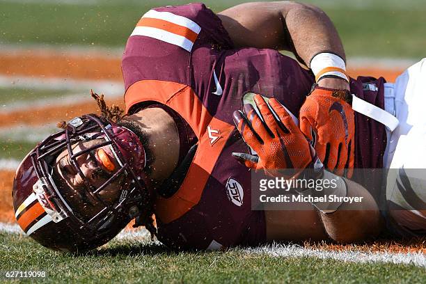 Tight end Bucky Hodges of the Virginia Tech Hokies reacts following an incomplete pass against the Virginia Cavaliers in the first half at Lane...
