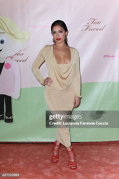 Singer/songwriter Inas X attends Too Faced Cosmetics launch of their Sweet Peach Collection for spring 2017 at The Lot on December 1, 2016 in West...