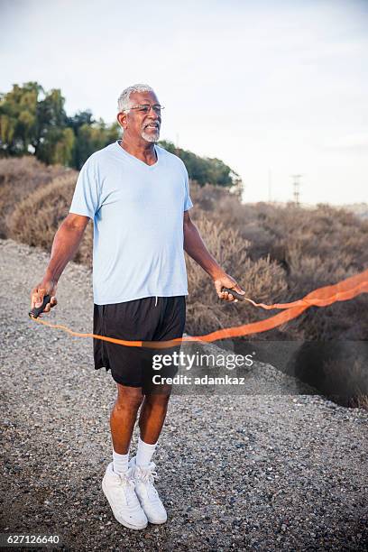 100 Senior Man Jump Roping Stock Photos, High-Res Pictures, and Images ...