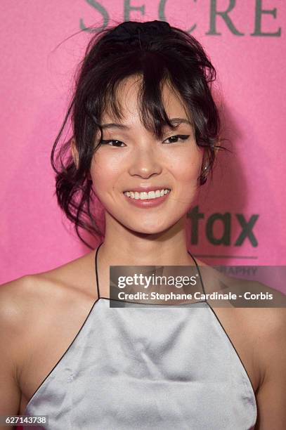 Xiao Wen attends '2016 Victoria's Secret Fashion Show' after show photocall at Le Grand Palais on November 30, 2016 in Paris, France.