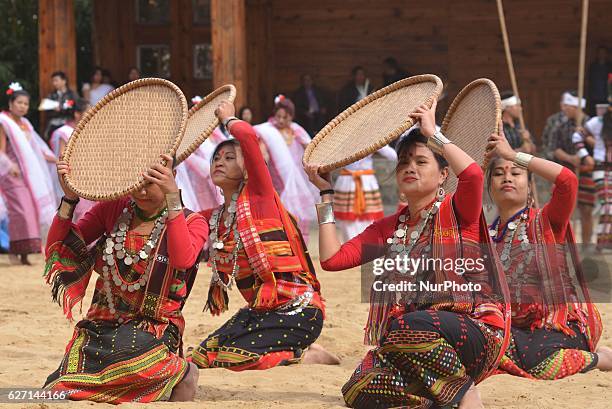 Artist from Tripura state perform a cultural dance on the second day of the state annual Hornbill Festival at the Naga Heritage village Kisama, some...