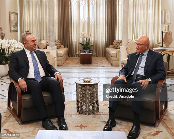 Lebanese Prime Minister Tammam Salam and Turkish Foreign Minister Mevlut Cavusoglu are seen during their meeting in Beirut, Lebanon on December 02,...