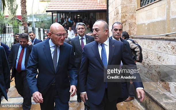 Lebanese Prime Minister Tammam Salam sees off Turkish Foreign Minister Mevlut Cavusoglu after their meeting in Beirut, Lebanon on December 02, 2016.