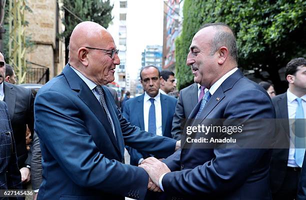 Lebanese Prime Minister Tammam Salam sees off Turkish Foreign Minister Mevlut Cavusoglu after their meeting in Beirut, Lebanon on December 02, 2016.