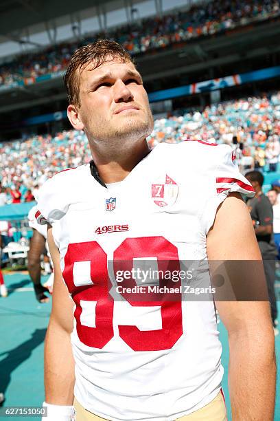Vance McDonald of the San Francisco 49ers stands on the sideline prior to the game against the Miami Dolphins at Hard Rock Stadium on November 27,...