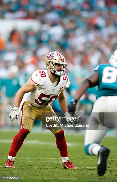 Nick Bellore of the San Francisco 49ers defends during the game against the Miami Dolphins at Hard Rock Stadium on November 27, 2016 in Miami...