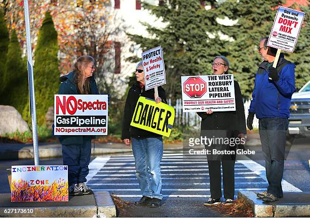 Group of demonstrators stood outside the entrance to the Spectra and National Grid gas pipeline control stations on Grove Street in the West Roxbury...