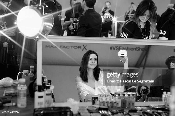 This Image has been converted to Black and White. Kendall Jenner prepares backstage prior to the Victoria's Secret Fashion Show on November 30, 2016...