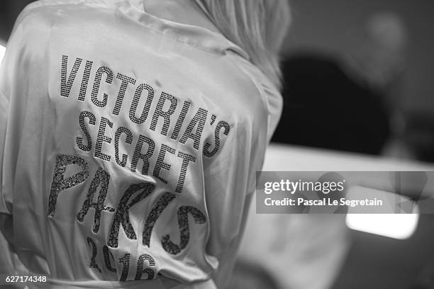 This Image has been converted to Black and White. A Model prepares backstage prior to the Victoria's Secret Fashion Show on November 30, 2016 in...