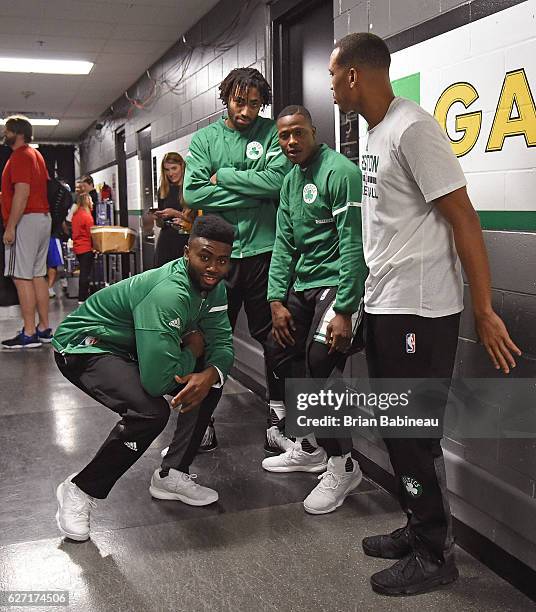 Jaylen Brown, James Young and Terry Rozier of the Boston Celtics pose for a photo in the tunnel before the game against the Detroit Pistons on...