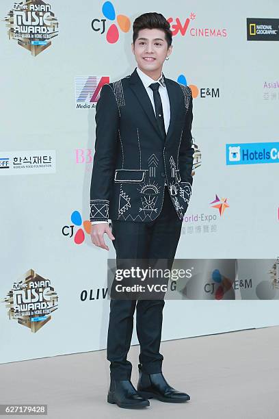 Singer Noo Phuoc Thinh arrives at the red carpet during the 2016 Mnet Asian Music Awards at AsiaWorld-Expo on December 2, 2016 in Hong Kong, Hong...