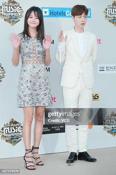 Actor Ahn Jae-hyun and model Hyoni Kang arrive at the red carpet during the 2016 Mnet Asian Music Awards at AsiaWorld-Expo on December 2, 2016 in...