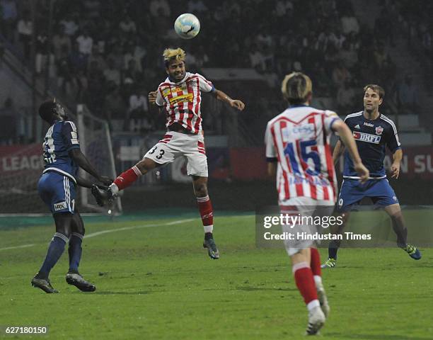 Prabir Das of ATK Kolkata is trying to clear a ball during the ISL match against Fc Pune City at Rabindra Sarobar stadium on December 2, 2016 in...