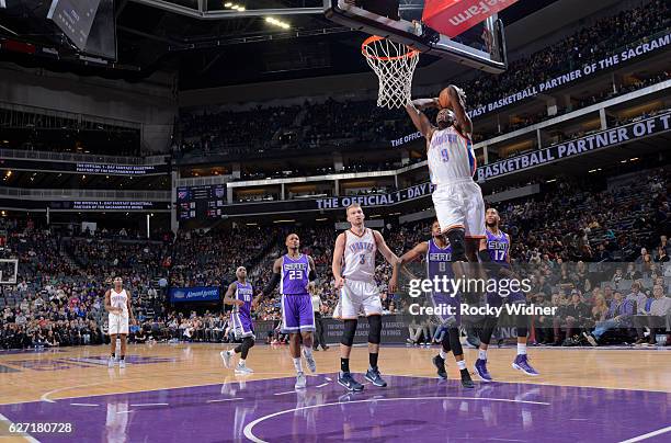 Jerami Grant of the Oklahoma City Thunder dunks against the Sacramento Kings on November 23, 2016 at Golden 1 Center in Sacramento, California. NOTE...