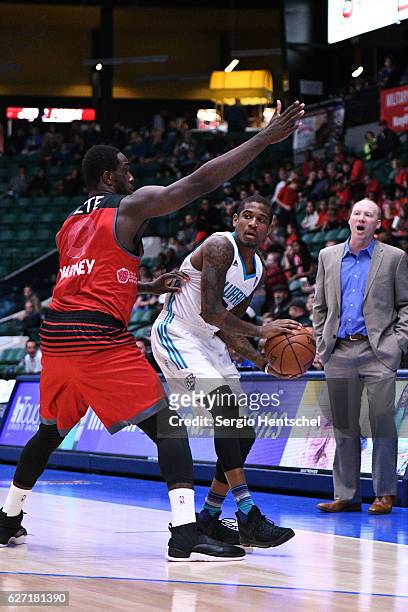 Xavier Munford of the Greensboro Swarm handles the ball against the Texas Legends at The Dr Pepper Arena on December 1, 2016 in Frisco, Texas. NOTE...