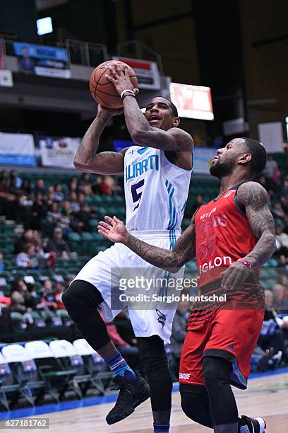Xavier Munford of the Greensboro Swarm shoots the ball against the Texas Legends at The Dr Pepper Arena on December 1, 2016 in Frisco, Texas. NOTE TO...