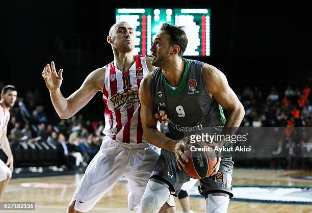 Semih Erden, #9 of Darussafaka Dogus Istanbul competes with Nikola Milutinov, #11 of Olympiacos Piraeus during the 2016/2017 Turkish Airlines...