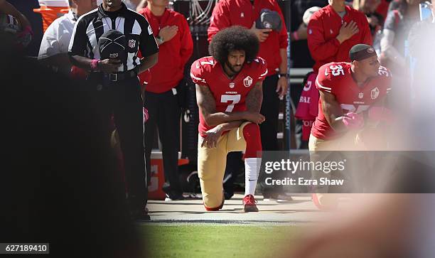 Colin Kaepernick of the San Francisco 49ers kneels for the National Anthem before their game against the Tampa Bay Buccaneers at Levi's Stadium on...