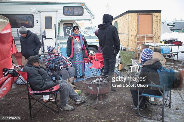 Members of the Lakota tribe from South Dakota volunteer at Oceti Sakowin Camp on the edge of the Standing Rock Sioux Reservation on December 2, 2016...