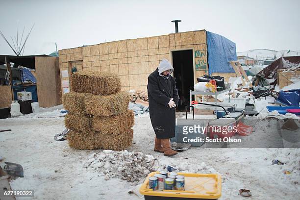 Native American activist volunteers at Oceti Sakowin Camp on the edge of the Standing Rock Sioux Reservation on December 2, 2016 outside Cannon Ball,...