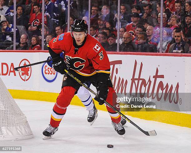 Jyrki Jokipakka of the Calgary Flames in action against the Toronto Maple Leafs during an NHL game at Scotiabank Saddledome on November 30, 2016 in...